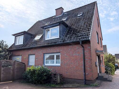 Bild 3 - 7 Zimmer Mehrfamilienhaus, Wohnhaus in Hasbergen