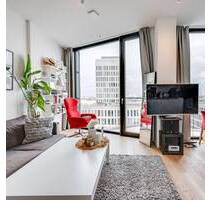 AIGNER - Modernes Wohnen im FRIENDS Tower: 1,5-Zimmer-Apartment mit einzigartigem Ausblick - München Neuhausen-Nymphenburg