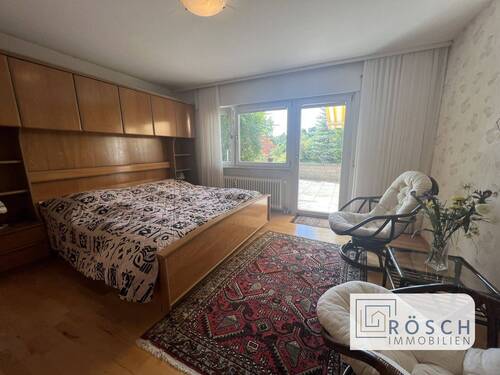 Schlafzimmer mit Zugang zur Terrasse - 