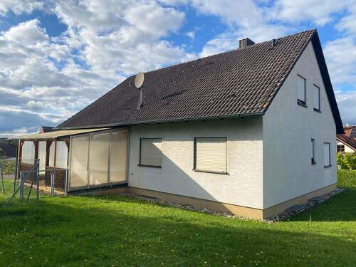 Blick vom Garten - Einfamilienhaus mit 96,20 m² in Grettstadt / Obereuerheim zum Kaufen