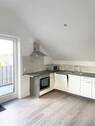 Küche - Hochwertige Dachgeschosswohnung mit Balkon in zentraler Lage von Haselünne