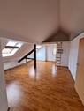 Wohnzimmer - Gemütliche 2-Raum-Wohnung im Dachgeschoss!
