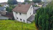 Ansicht Garten - 6 Zimmer Mehrfamilienhaus, Wohnhaus zum Kaufen in Brachbach