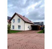 Doppelhaushälfte mit Terrasse, Carport und Gerätehaus in Molbergen