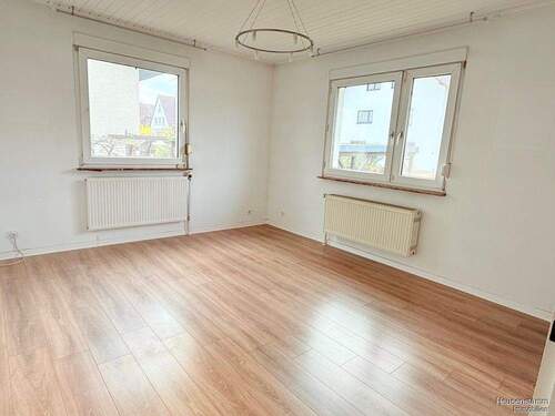 Wohnzimmer - 3 Zimmer Einfamilienhaus zum Kaufen in Heusenstamm