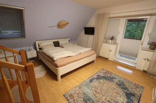 Schlafzimmer Eltern mit Balkon - 