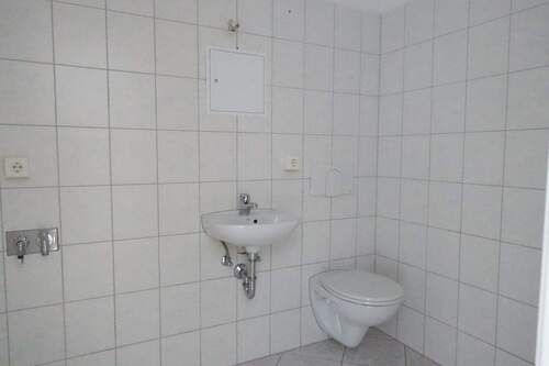 Musterbild Gäste-WC mit Anschluss Waschmaschine - 