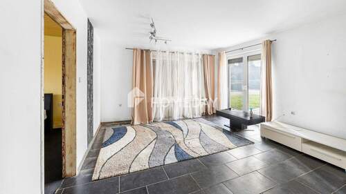 EG Wohnzimmer 1 - Einfamilienhaus mit 128,00 m² in Berne zum Kaufen