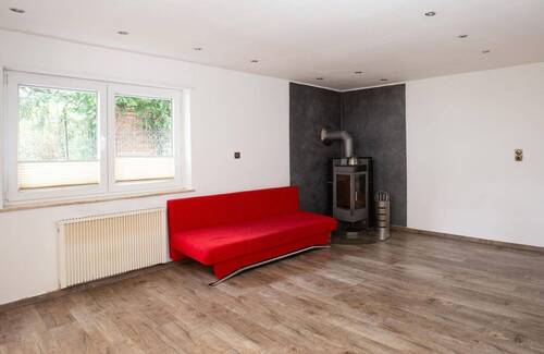 Wohnzimmer EG m. Kaminofen - 