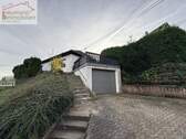 Garage mit Zugang zum Haus - Einfamilienhaus mit 96,00 m² in Hausen (Wied) / Frorath zur Miete