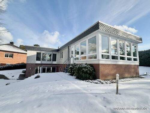 seitlicher Blick mit Wintergarten - Einfamilienhaus mit 160,00 m&sup2; in Molfsee zum Kaufen