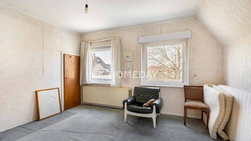 1. OG Schlafzimmer 1 - 