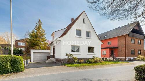 Außenansicht 2 - Charmantes Einfamilienhaus mit großem Garten, Dachterrasse und Potenzial