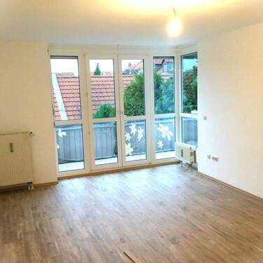 Heller Wohnraum zum Balkon - Schicke, helle 2-Zimmerwohnung zum Wohlfühlen ca. 62m² in optimaler Lage