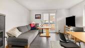 Wohnzimmer 1 - Moderne 3-Zimmer-Wohnung mit Kaminofen, Balkon und hochwertiger Ausstattung