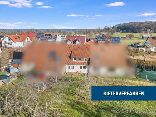 Bild 1 - Bieterverfahren! Sanierungsbedürftiges Reihenhaus in KirchheimTeck-Nabern mit großem Garten