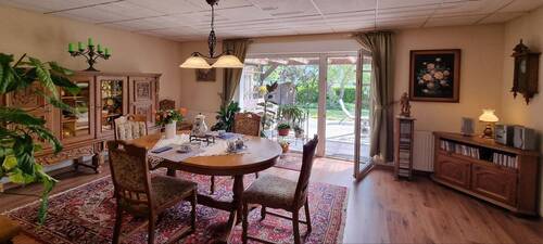 Wohnzimmer mit Terrassenzugang - Einfamilienhaus mit 130,00 m&sup2; in Eggesin zum Kaufen