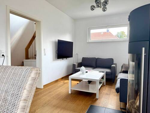 Wohnzimmer - Einfamilienhaus mit 126,00 m² in Wunstorf zum Kaufen