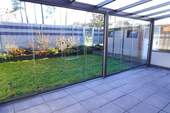 Überdachte Terrasse und Garten - 