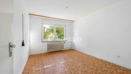 1. OG Schlafzimmer 1 - 