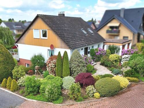 Luftaufnahme Vorderansicht - Einfamilienhaus mit 138,40 m&sup2; in Minden zum Kaufen