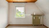 1. OG Schlafzimmer 1 - 