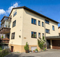 Gepflegte 4,5-Zimmerwohnung mit off. Kamin, Wintergarten und gem. Gartenbereich - Steinenbronn