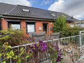 Hauseingang und Sonnige Terrasse der Obergeschosswohnung– Ihr neuer Lieblingsplatz im Freien - 5 Zimmer Mehrfamilienhaus, Wohnhaus zum Kaufen in Fehmarn / Landkirchen auf Fehmarn