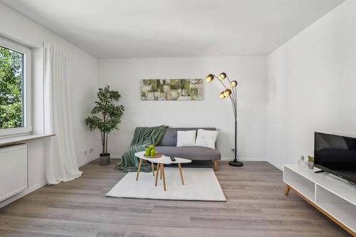 Wohnzimmer - 2 Zimmer Etagenwohnung in Homburg