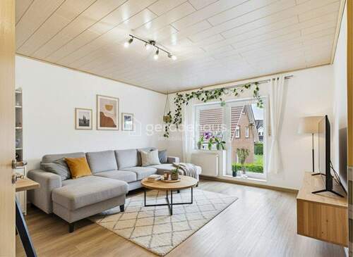 Wohnzimmer - Doppelhaushälfte mit 161,00 m&sup2; in Lingen / Altenlingen zum Kaufen