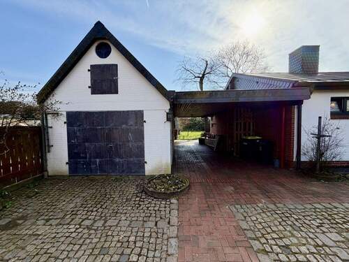 Garage und Carport - Einfamilienhaus mit 168,80 m&sup2; in Nindorf zum Kaufen