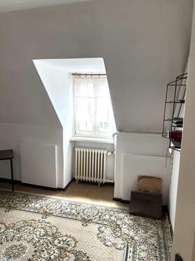 Zimmer im Dachgeschoss - 