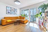 Wohnzimmer - Stilvolle 3-Zimmer-Wohnung in begehrter Lage von München - Modernes Wohnen auf höchstem Niveau!