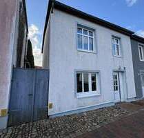 Kompaktes Reihenendhaus in Burg - ideale Lage, großes Potenzial - Fehmarn / OT Burg Burg auf Fehmarn