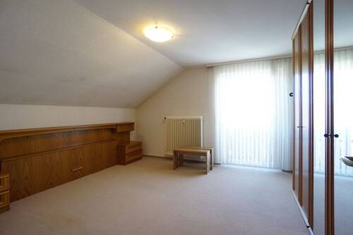 Schlafzimmer im Dachgeschoss - 