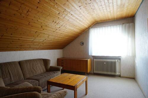 Zimmer im Dachgeschoss - 