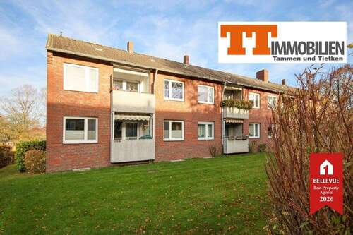 Außenansicht - TT bietet an: Ruhig. Grün. Vermietet - Gepflegte 3-Zimmer-EG-Wohnung mit Balkon und Garage in Wilhelmshaven-Altengroden!