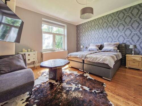 Schlafzimmer Hauptwohnung - 1 Zimmer Mehrfamilienhaus, Wohnhaus zum Kaufen in Wewelsfleth