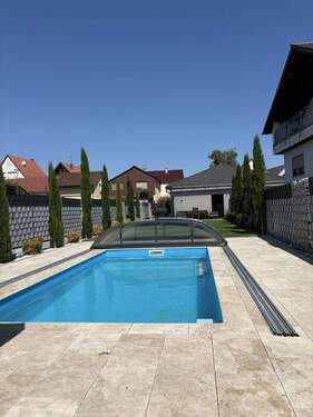 Bild 1 - Neuwertiger Bungalow - 850.000,00 EUR Kaufpreis, ca.  150,00 m² Wohnfläche