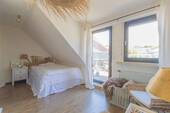 Schlafzimmer mit Zugang zur Dachterrasse - 