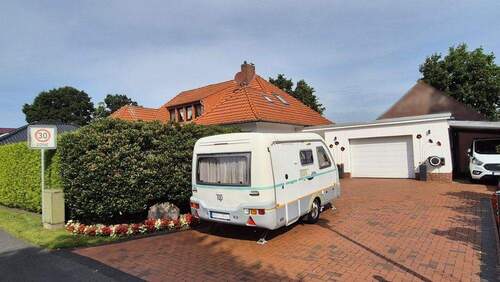 Straßenansicht - 6 Zimmer Bungalow zum Kaufen in Rhauderfehn