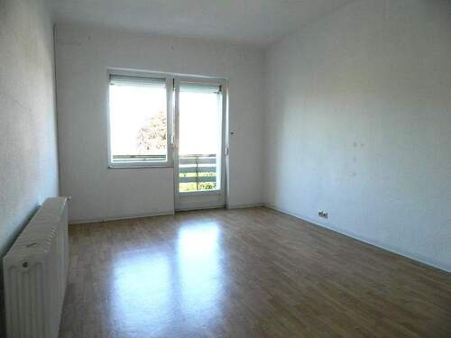 Obergeschoss Wohnzimmer mit Balkon - 