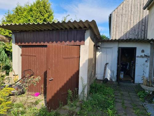 Garage - Einfamilienhaus mit 147,00 m&sup2; in Gorden-Staupitz zum Kaufen