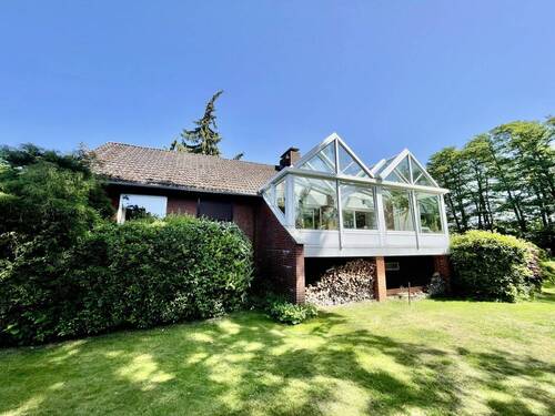 Außenansicht mit Wintergarten - 3 Zimmer Einfamilienhaus in Seevetal
