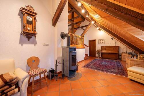 Einheit im Obergeschoss: gemütliches Wohnzimmer - 