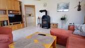 Wohnzimmer mit Kaminofen - 