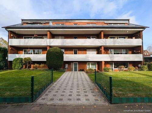 Hausansicht von Vorne - Provisionsfrei für Käufer: 3-Zimmer-Eigentumswohnung mit großem Balkon und Garage in Hamm-Heessen