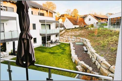 1. Obergeschoss - Moderne, zentral gelegene 3-Zimmer-Wohnung mit Balkon, EBK, TG-Stellplatz und Aufzug