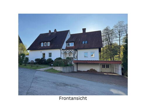 Hausansicht von der Straße aus - Großes gepflegtes freistehendes Einfamilienhaus mit Top-Lage in Bielefeld-Vilsendorf