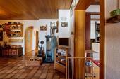 Erdgeschoss, Flurbereich mit Kaminofen - 